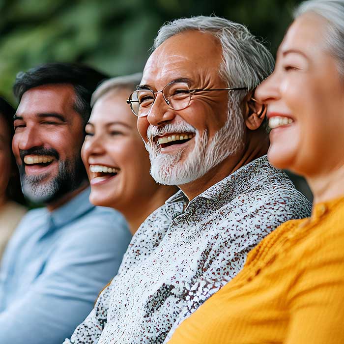 cosmetic-dentistry-feature-square Five Friends Sharing a Joyful Moment Together, Laughter and Camaraderie in the Garden